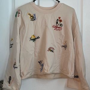 Women’s cream embroidered long flare sleeve top